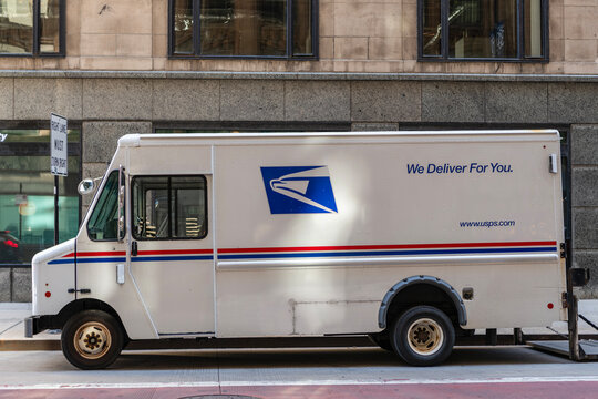 Chicago, Illinois, USA - October 08, 2024: USPS mail delivery truck. USP lorry postal service. Delivery truck courier company. Postal company USPS mail delivery truck