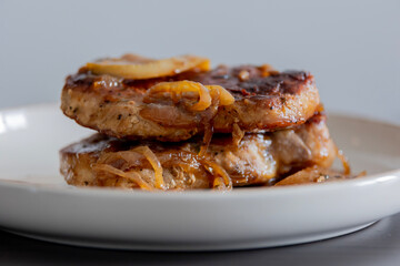 juicy pork chops with caramelized onions and apples fall meal