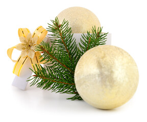 Golden Christmas decorations with fir branch and ribbon isolated on white background