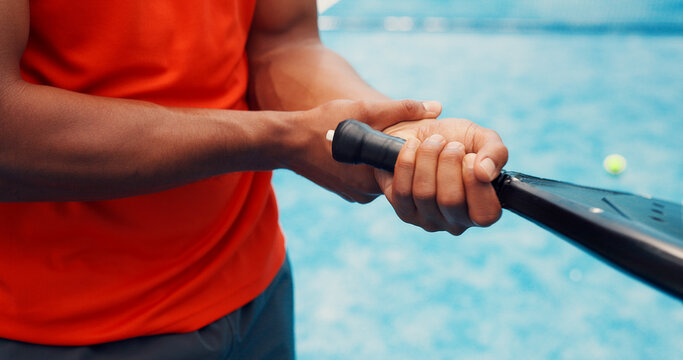 Wrist pain, hands or man with padel for sports injury, outdoor workout or strain for inflammation. Tennis court, poor technique or athlete with tendinitis from training game, muscle tension or sprain