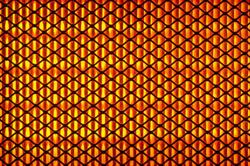 A close-up of the grill. The hot grill is orange.