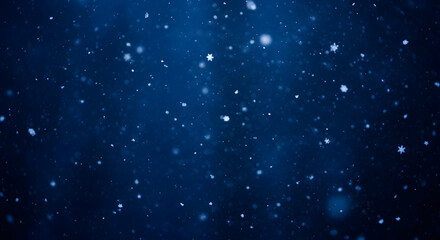 Obraz premium Snowfall scene at nighttime on a dark blue background 89114459 1