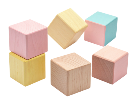 Soft-hued wooden cubes stacked haphazardly