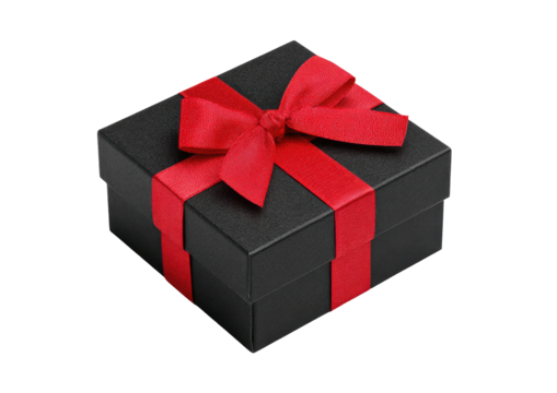 Black box with red ribbon bow against a black background