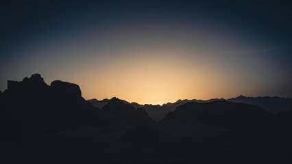 rocky mountains and desert landscape and sunset sky in Egypt