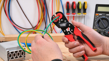 electrician with multimeter