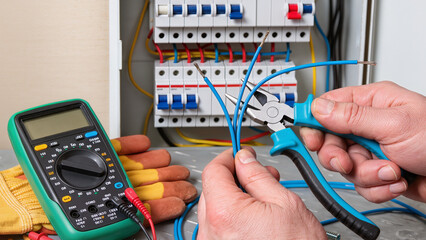 electrician testing electrical wires