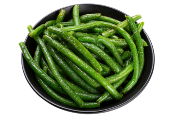Steamed green beans in a dark bowl on a black background