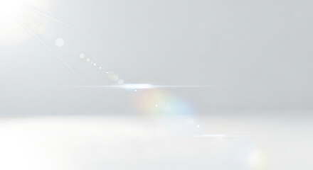Dynamic bright lens flare effect creating a radiant and ethereal light streak across a clean, minimalist white and grey background, perfect for modern design overlays and digital enhancements