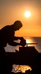 Silhouetted Artisan Honing a Blade Against a Radiant Sunset Backdrop