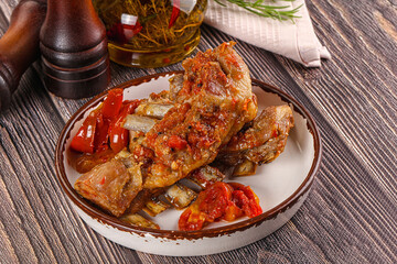 Baked lamb ribs with vegetables