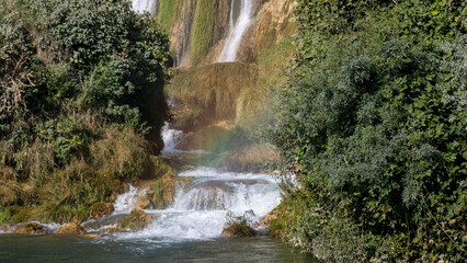Kravitsa Cascading emerald waterfalls echo tranquility amidst lush whispering foliage, embracing Earth Day spirit and Romanian Dragobete romance