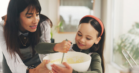 Baking, mother or child with mixing bowl in kitchen, meal prep or helping with dessert for bonding....