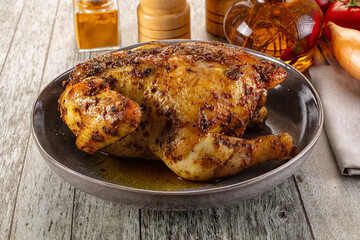Baked in oven whole chicken with spices