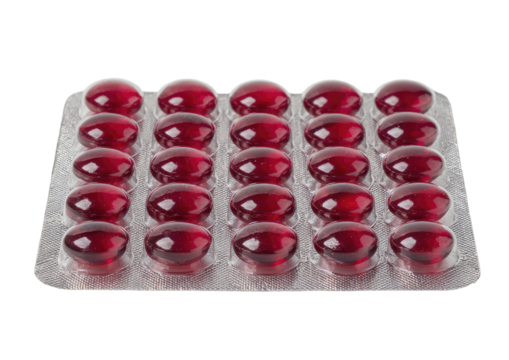 Red gel capsules in blister pack, isolated