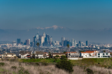 Skyline. Downtown Los Angeles and the Mount San Antonio(San Gabriel Mountains) from Kenneth Hahn State Recreation Area, Baldwin Hills Mountains of Los Angeles, California. Los Angeles smog