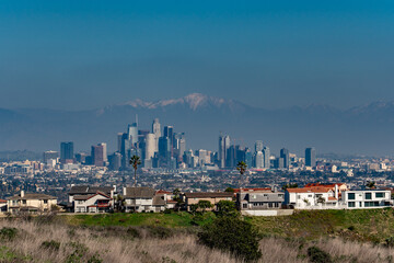 Skyline. Downtown Los Angeles and the Mount San Antonio(San Gabriel Mountains) from Kenneth Hahn State Recreation Area, Baldwin Hills Mountains of Los Angeles, California. Los Angeles smog