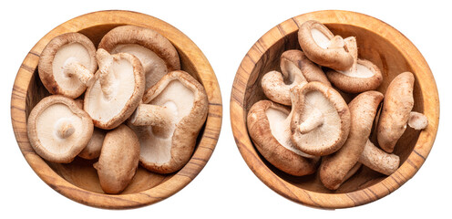 Raw shiitake mushrooms in wooden bowls on white background, top view. File contains clipping paths.