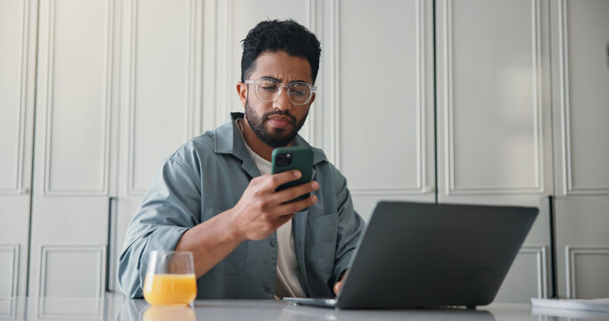 Remote work from home, laptop and man with cellphone, internet and online reading with copywriting. Apartment, person and writer with pc, smartphone and message to contact, app and email notification