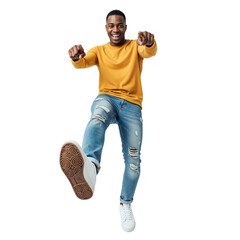 Cheerful Young Black Man Jumping and Pointing Towards Camera While Wearing Casual Yellow Sweater and Jeans