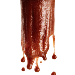 Dense, viscous brown liquid drips from an unseen object