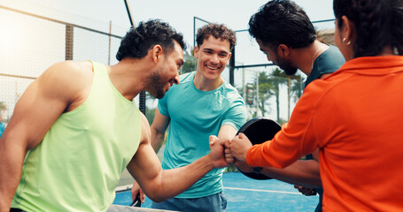 People, team and fist bump for padel, sports and excited for celebration, success or challenge for game. Men, woman and happy for support, training or achievement with contest on tennis court at club © FlexOn/peopleimages.com