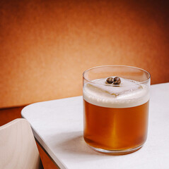 Relaxing with a cold brew coffee cocktail at a modern cafe setting