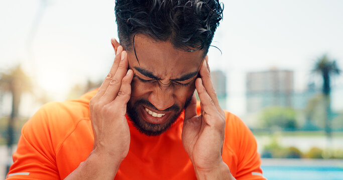 Man, headache and tennis with stress, sports and fatigue with training routine, pain or vertigo. Person, athlete and migraine with temple massage, frustrated or burnout with fitness at pade court