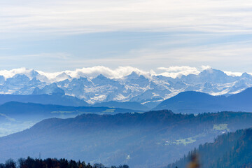 Aerial view of beautiful Swiss autumn landscape with Swiss Alps seen from local mountain Uetliberg on a sunny autumn day. Photo taken October 29th, 2025, Zurich Uetliberg, Switzerland.