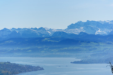 Aerial view of beautiful Swiss autumn landscape with Swiss Alps and Lake Zurich seen from local mountain Uetliberg on a sunny autumn day. Photo taken October 29th, 2025, Zurich Uetliberg, Switzerland.