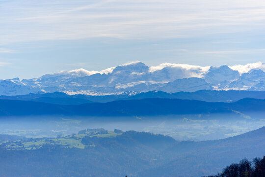 Aerial view of beautiful Swiss autumn landscape with Swiss Alps seen from local mountain Uetliberg on a sunny autumn day. Photo taken October 29th, 2025, Zurich Uetliberg, Switzerland.