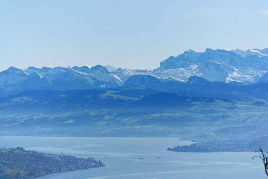 Aerial view of beautiful Swiss autumn landscape with Swiss Alps and Lake Zurich seen from local mountain Uetliberg on a sunny autumn day. Photo taken October 29th, 2025, Zurich Uetliberg, Switzerland.