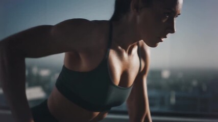 Determined woman performing a focused strength training workout with weights