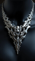 Fototapeta premium Modern jewelry photography highlighting the shape and elegance of a silver necklace
