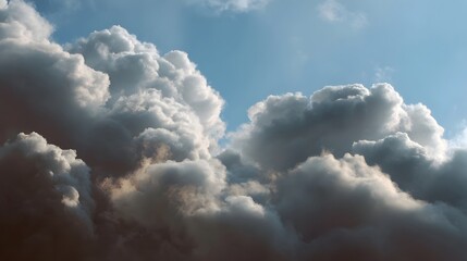 Fototapeta premium Dramatic cumulus clouds with deep shadows and bright highlights against a vibrant blue sky illuminated by natural sunlight