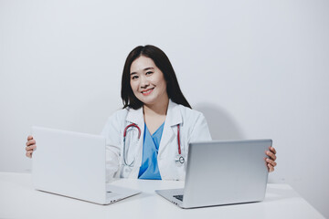 Receptionist working at the hospital registering patients
