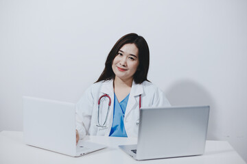 Receptionist working at the hospital registering patients