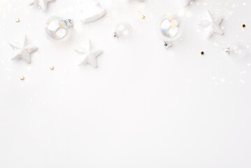 Festive Christmas ornaments on a white background.