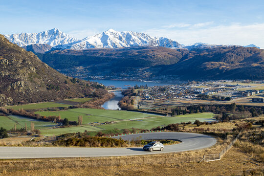A view from the Remarkables mountain range near Queenstown, New Zealand, looking down on the suburb of Frankton and Lake Wakatipu