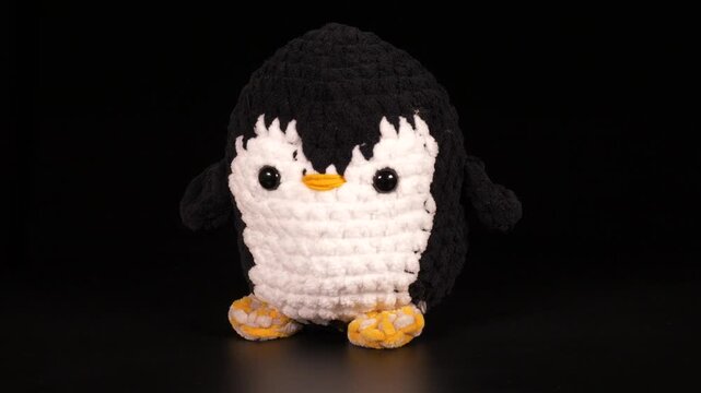 Close-up footage of animal figures knitted with threads.