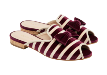 Isolated pair of striped velvet mules with bows for women, fashionable and comfortable style