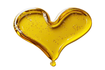 Gleaming heart made of amber liquid against a black background