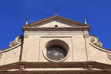Sant'Agostino in Campo Marzio Basilica Facade Detail against a Blue Sky in Rome, Italy