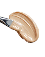 Foundation smear with brush beige, smooth, flowing on black