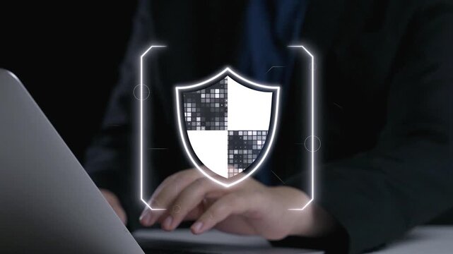 Digital security concept featuring a shield and padlock icons above a laptop display. This imagery emphasizes the importance of cybersecurity and data privacy in technology. Qubit
