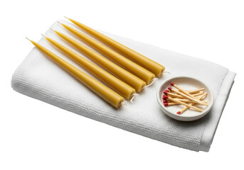 Candles and matches on white cloth