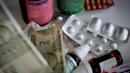 Falling ₹500 Indian Banknotes Over Expensive Medicine Pills in Slow Motion – Healthcare & Finance - Powered by Adobe