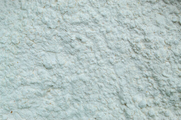 uneven texture of coarse and fine white powder