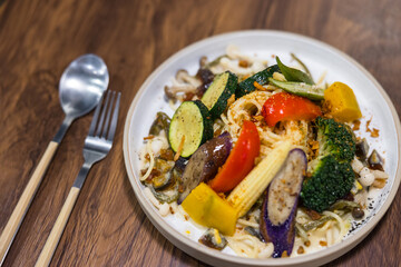 Healthy vegetable pasta served with eggplants broccoli pepper
