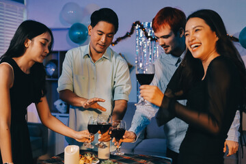 Diversity, dinner and group of people toast celebration together at party. Friends, happy and celebrate with food, wine and friendship for love, support and cheers champagne at business function